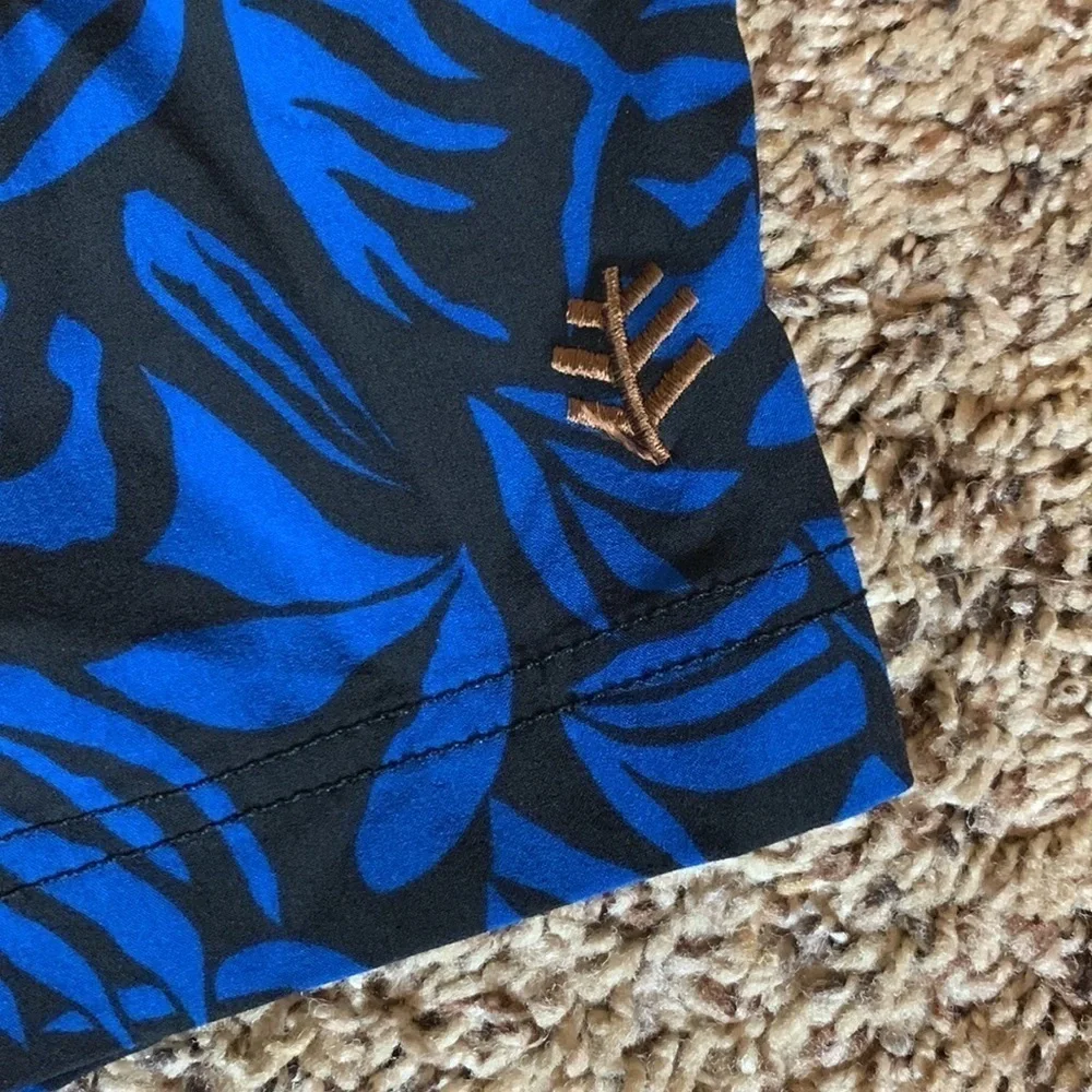 Coolibar Island swim trunks Blue and black print Size XXL UPF 50+